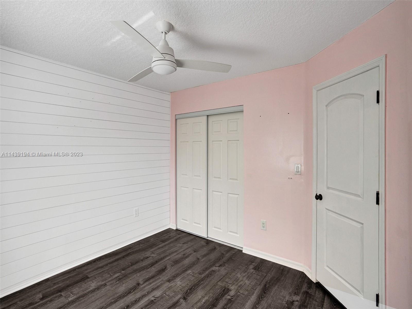 4185 Tree Top Road Cooper City, FL 33026 - Photo 24 of 36 a view of small space with wooden floor