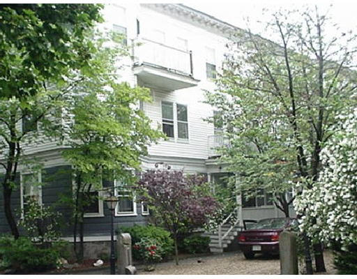 28 Stanton Road, Unit 2 28 Brookline, MA 02445 - Photo 1 of 1 a front view of a house with a garden