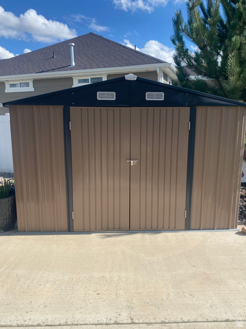 886 River Ridge Lane Spanish Fork, UT 84660 - Photo 29 of 31 Outdoor storage shed with dual front doors and a sloped roof, one of 2 sheds besides huge shop