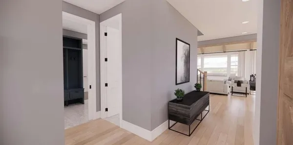 a living room with furniture and a lamp