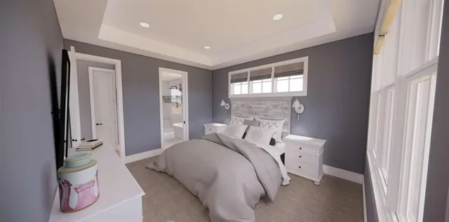 a bathroom with a double vanity sink a toilet a mirror and shower