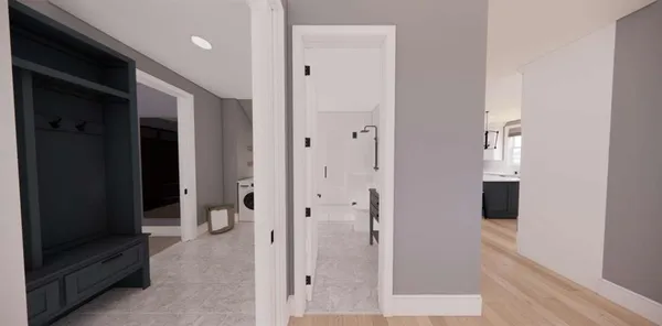 wooden floor with a bathroom