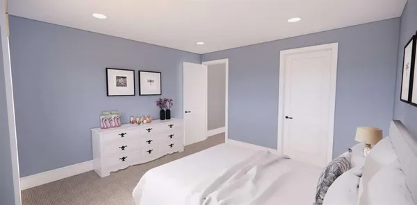 an empty room with closet and wooden floor