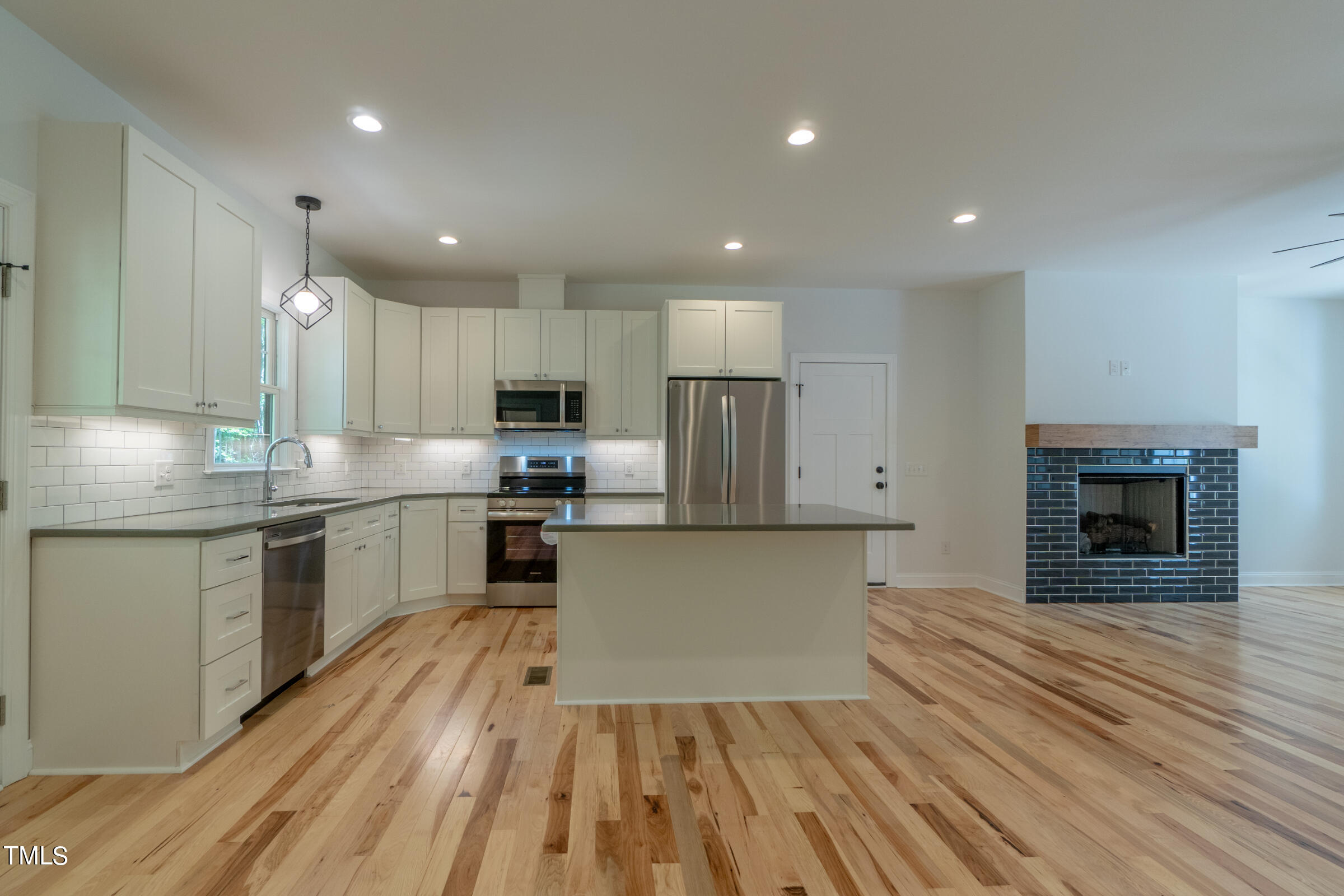 206 Goose Lane Mebane, NC 27302 - Photo 16 of 37 a large kitchen with cabinets