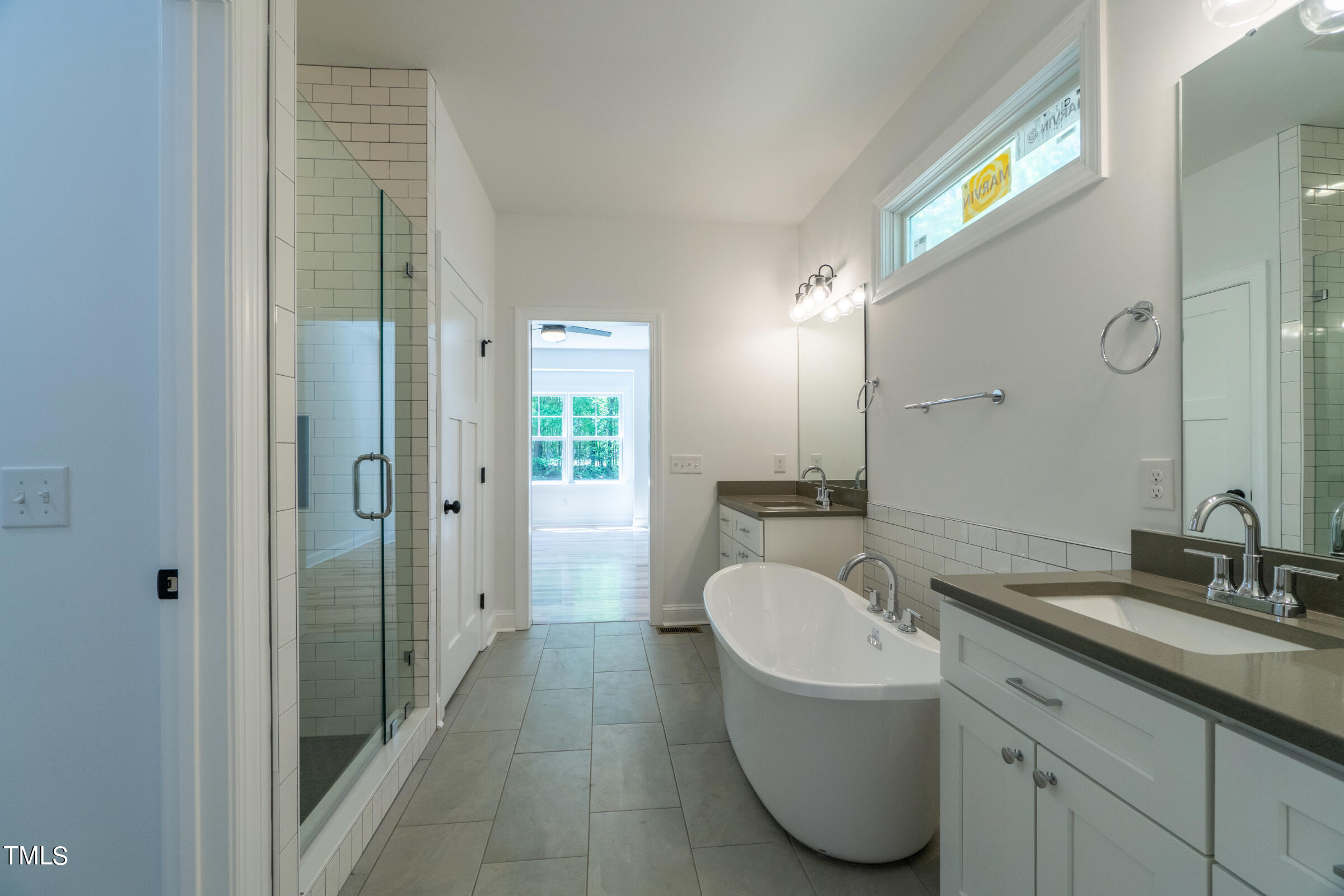 206 Goose Lane Mebane, NC 27302 - Photo 21 of 37 a bathroom with a granite countertop sink a toilet and mirror