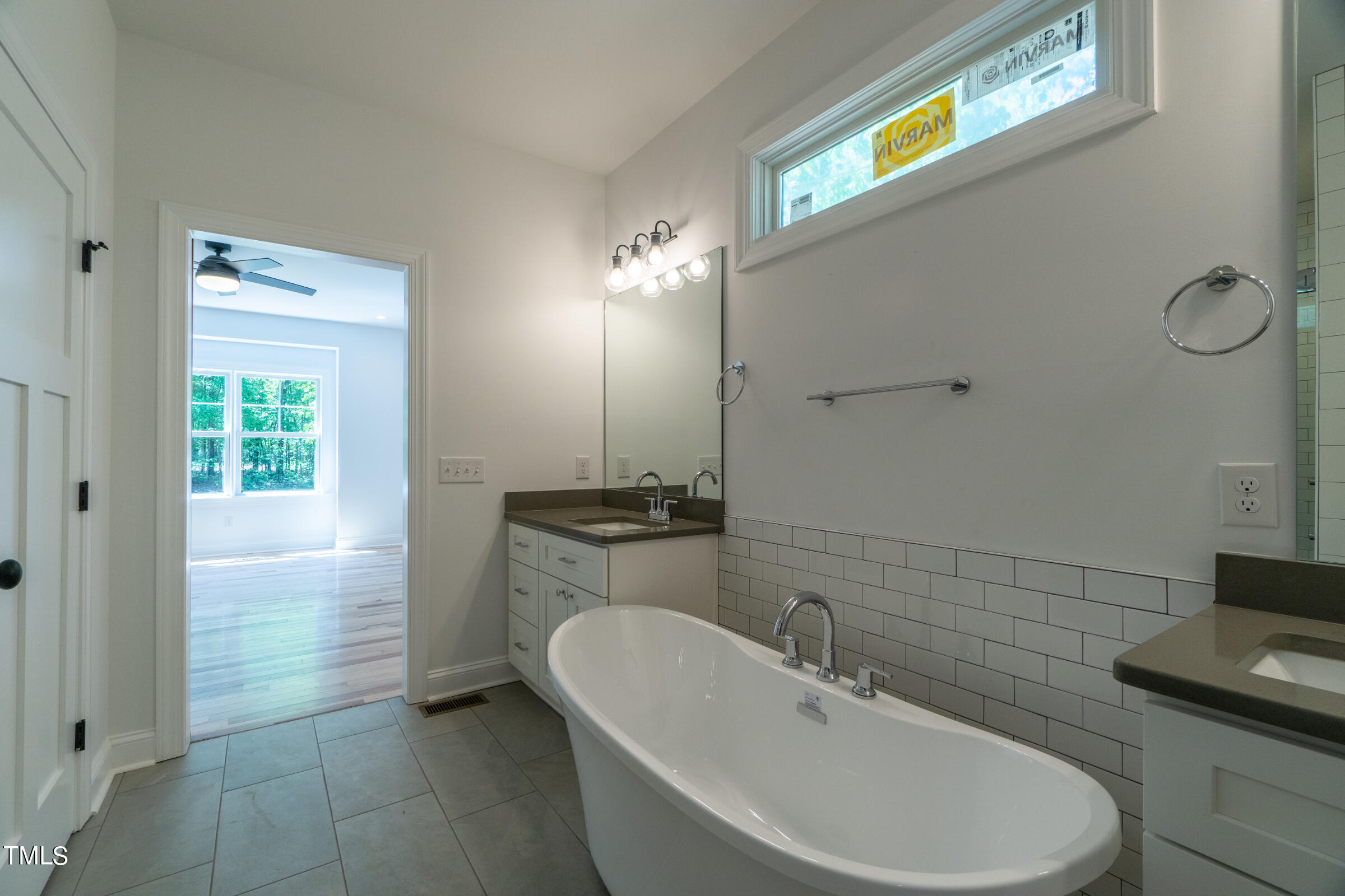 206 Goose Lane Mebane, NC 27302 - Photo 23 of 37 a bathroom with a sink a toilet and a mirror