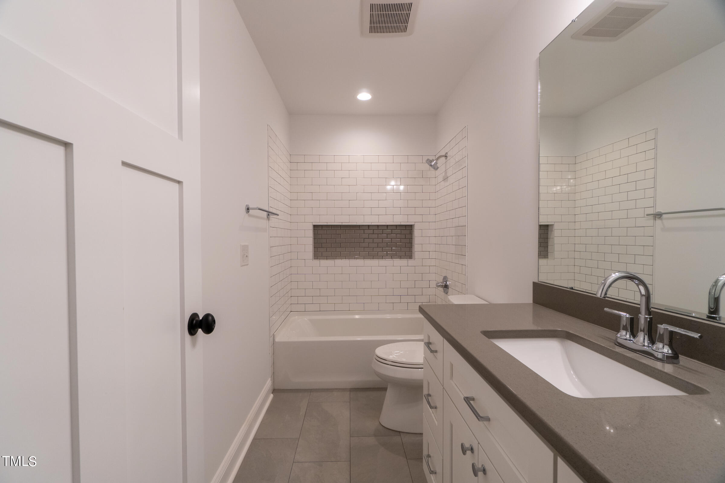 206 Goose Lane Mebane, NC 27302 - Photo 30 of 37 a bathroom with a sink a toilet and shower