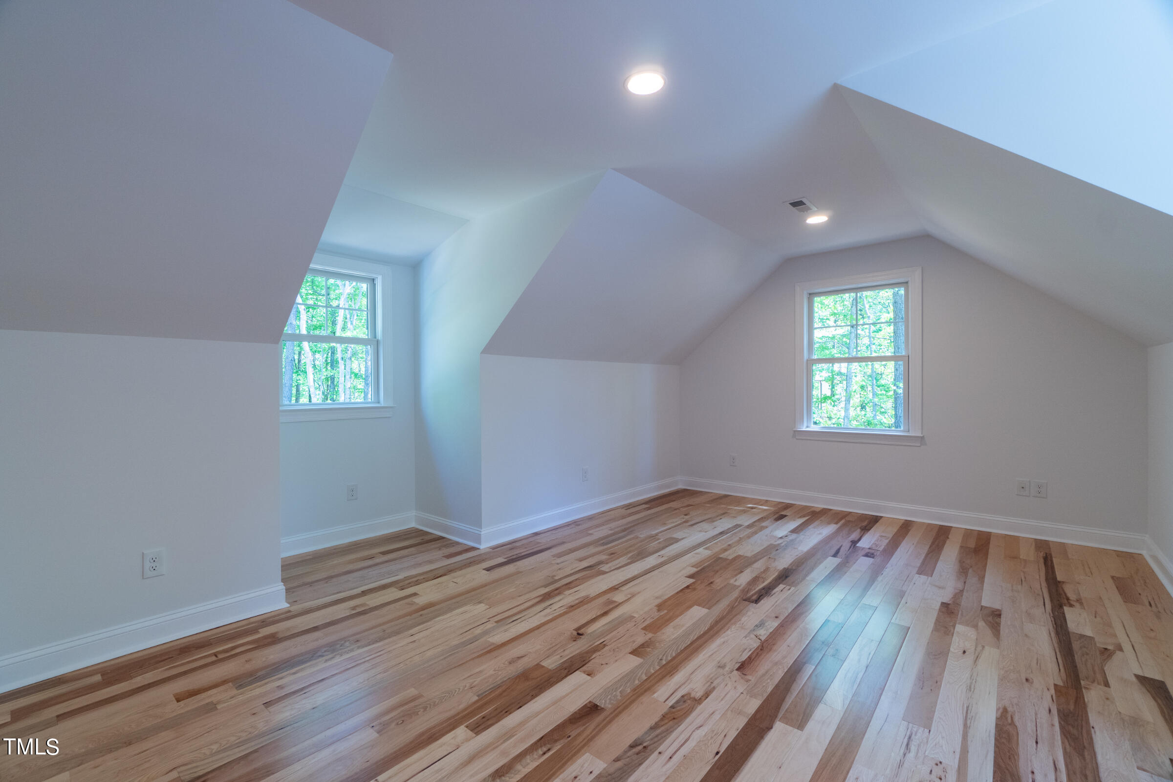 206 Goose Lane Mebane, NC 27302 - Photo 33 of 37 an empty room with wooden floor and windows