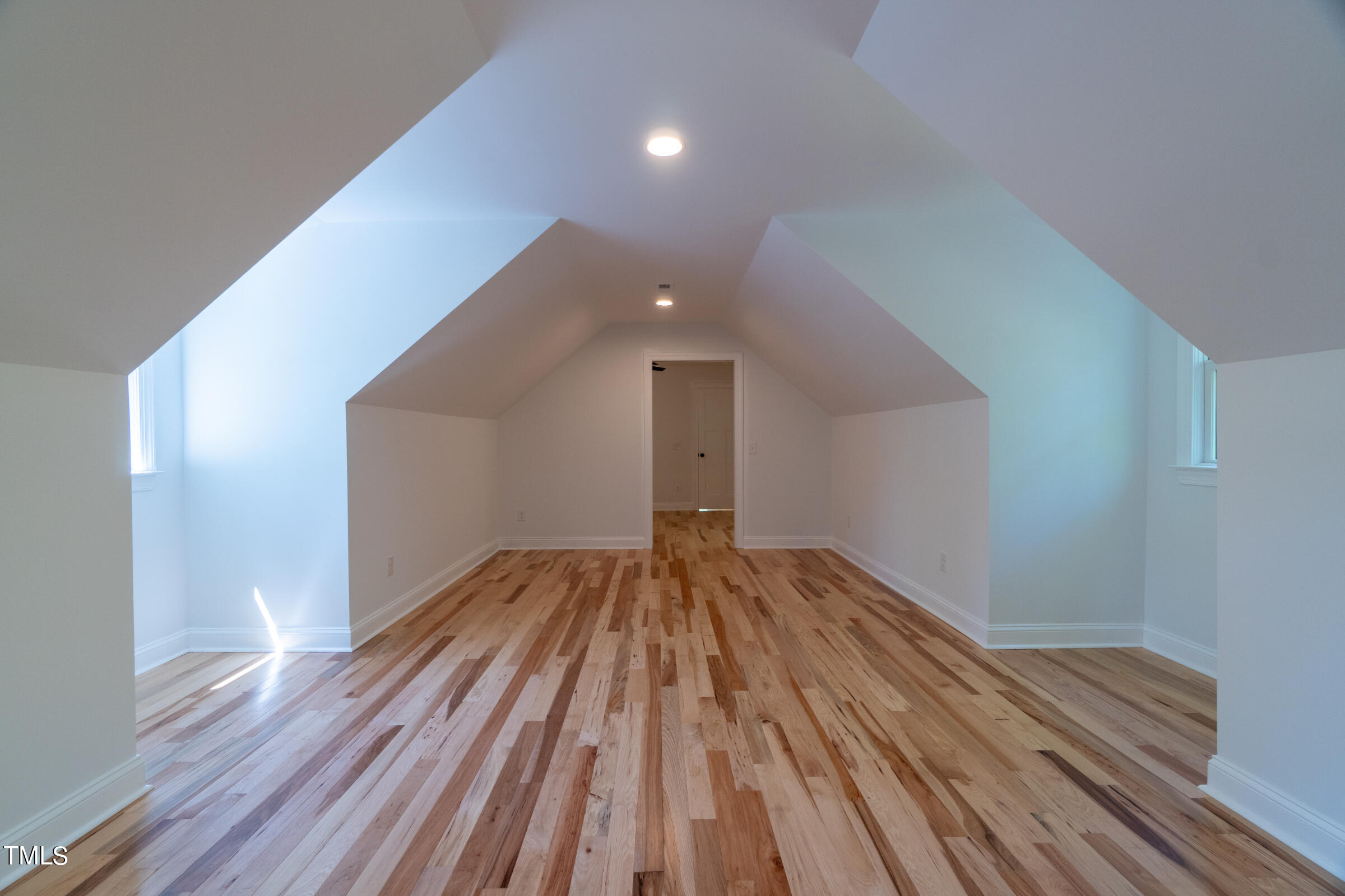 206 Goose Lane Mebane, NC 27302 - Photo 35 of 37 a view of empty room with wooden floor