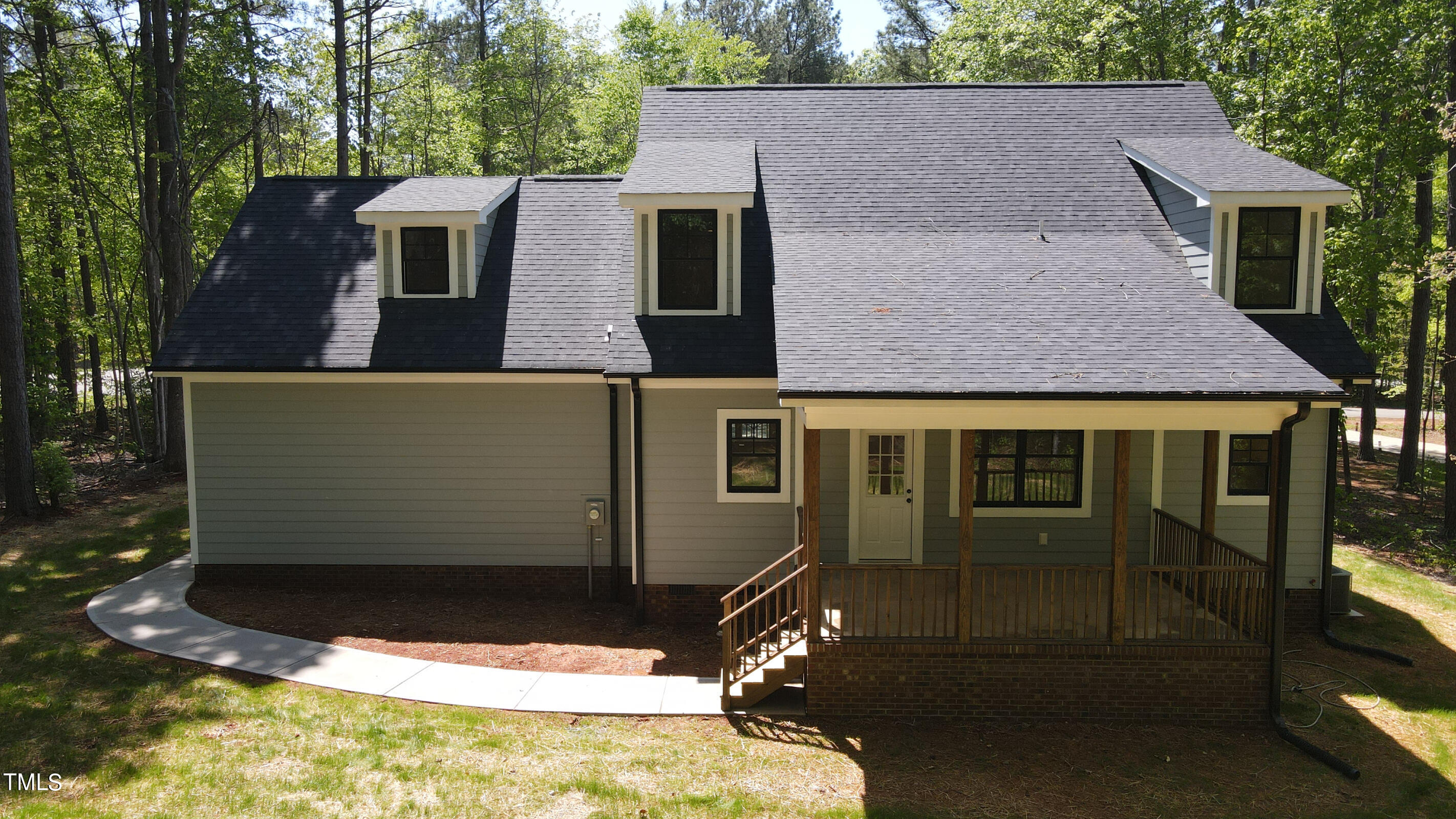 206 Goose Lane Mebane, NC 27302 - Photo 5 of 37 a view of a house with a yard