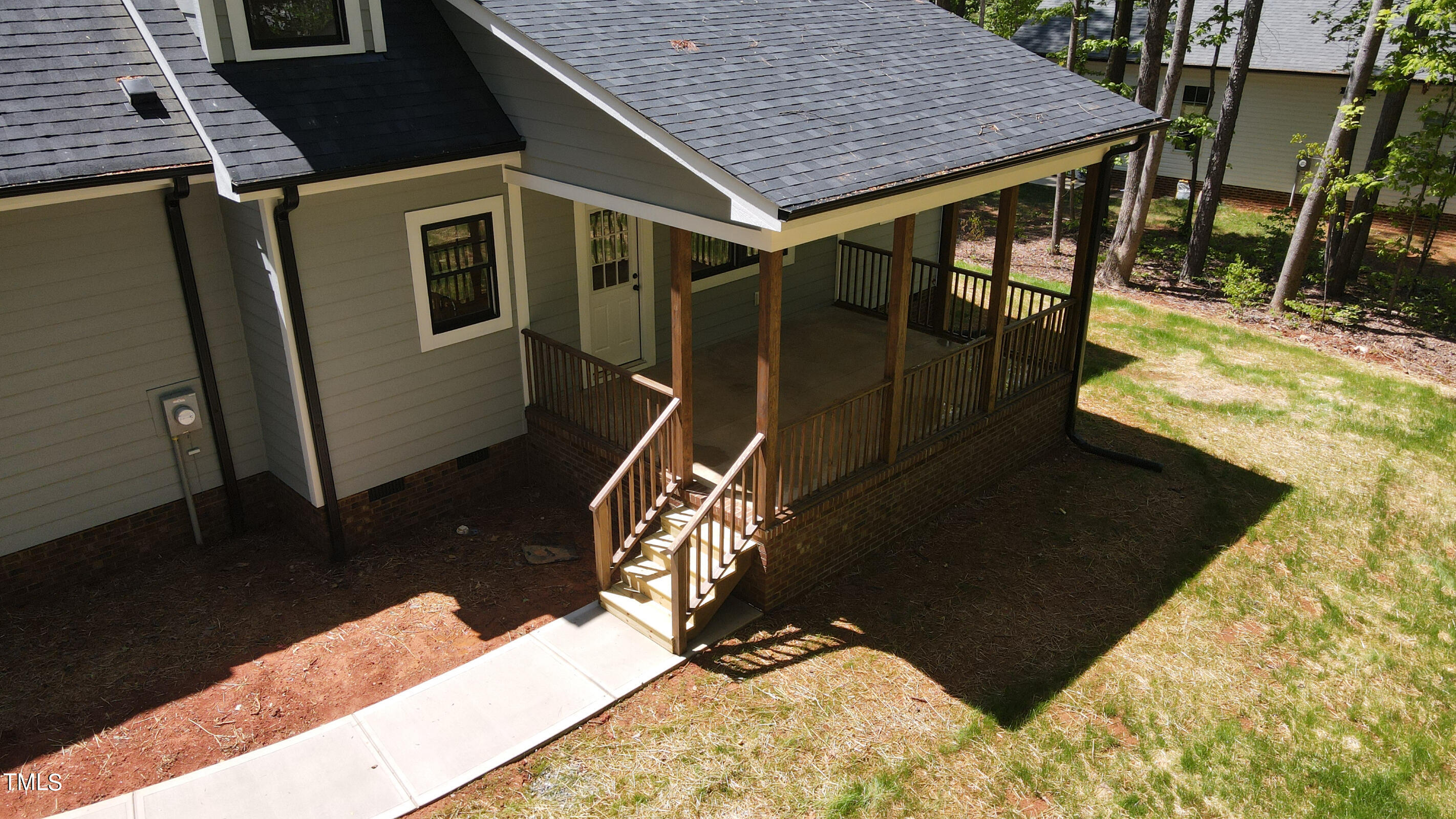 206 Goose Lane Mebane, NC 27302 - Photo 7 of 37 a terrace with outdoor seating and wooden floor