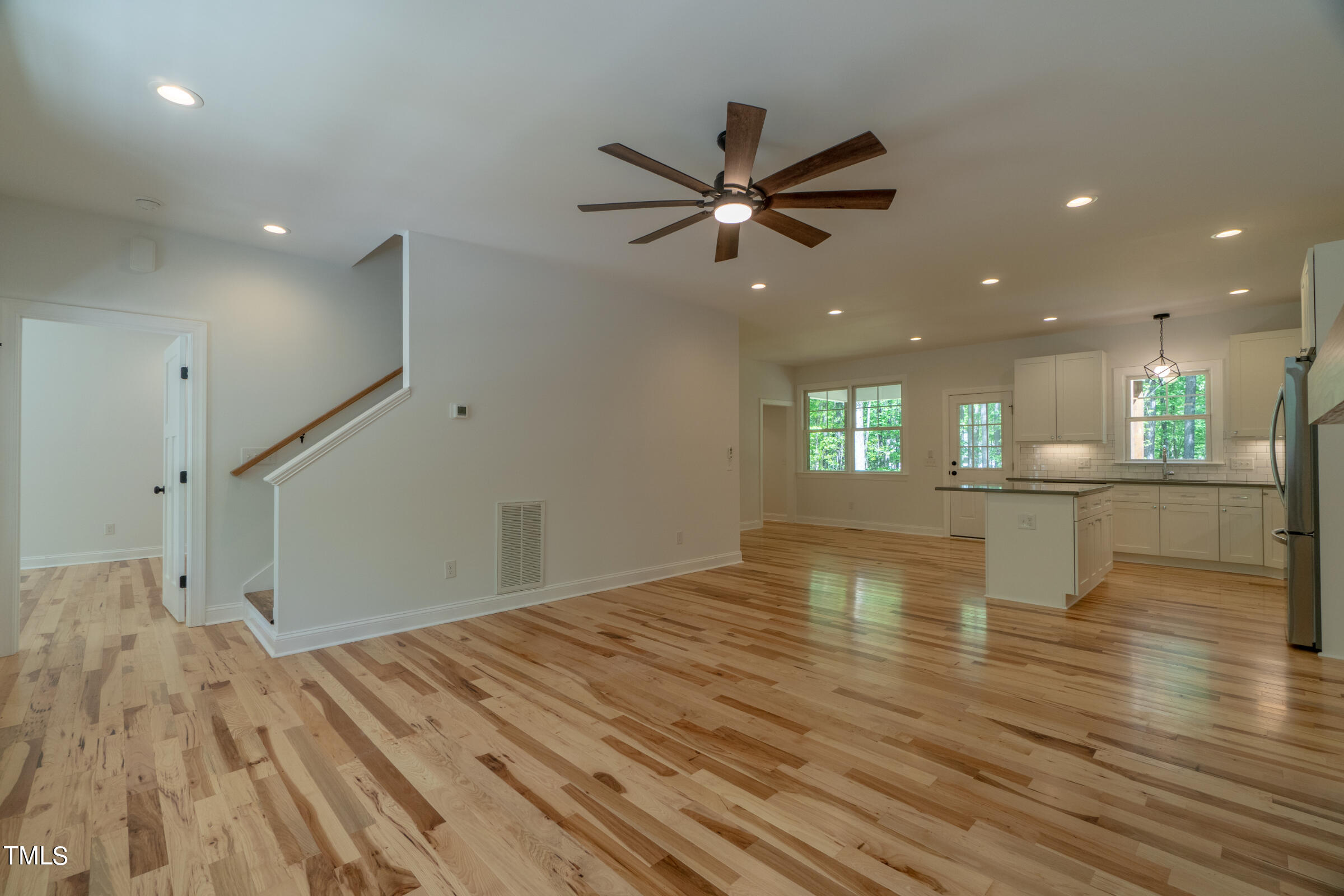 206 Goose Lane Mebane, NC 27302 - Photo 10 of 37 a view of empty room with wooden floor and window