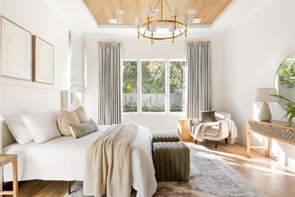 6541 Oriole Drive Dallas, TX 75209 - Photo 16 of 31 a bedroom with a bed and a window