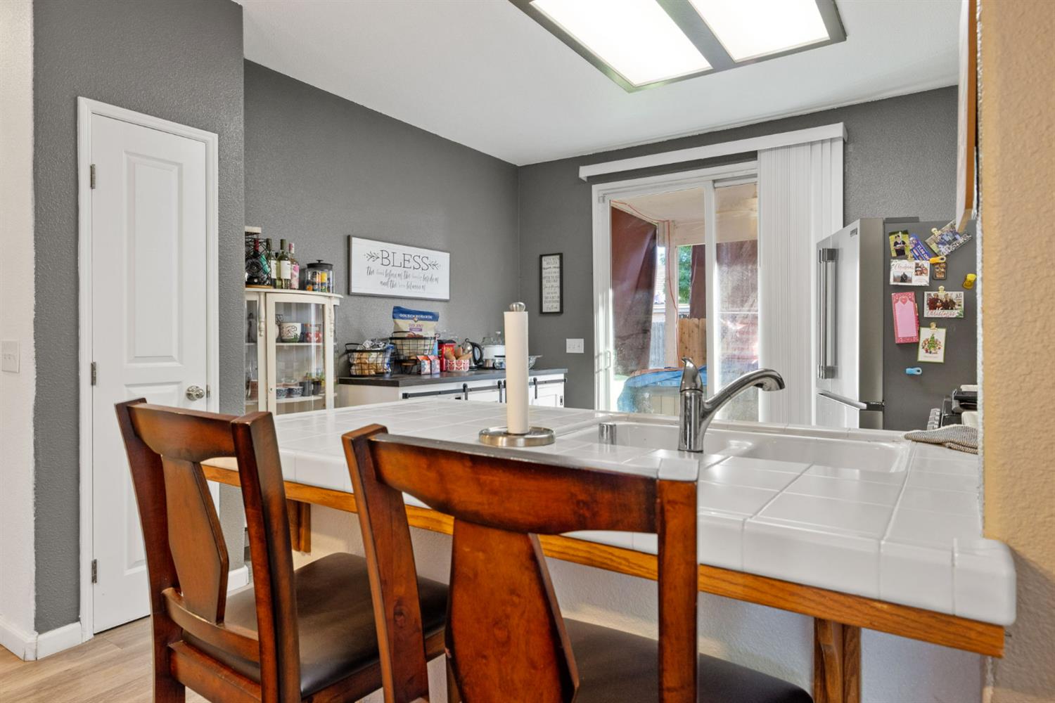 1963 West Merritt Street Hanford, CA 93230 - Photo 11 of 32 a dining room with furniture and window