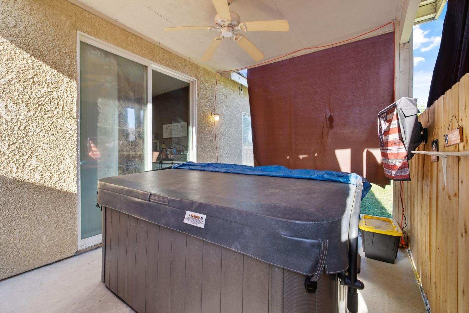1963 West Merritt Street Hanford, CA 93230 - Photo 32 of 32 a view of room with furniture and a flat screen tv