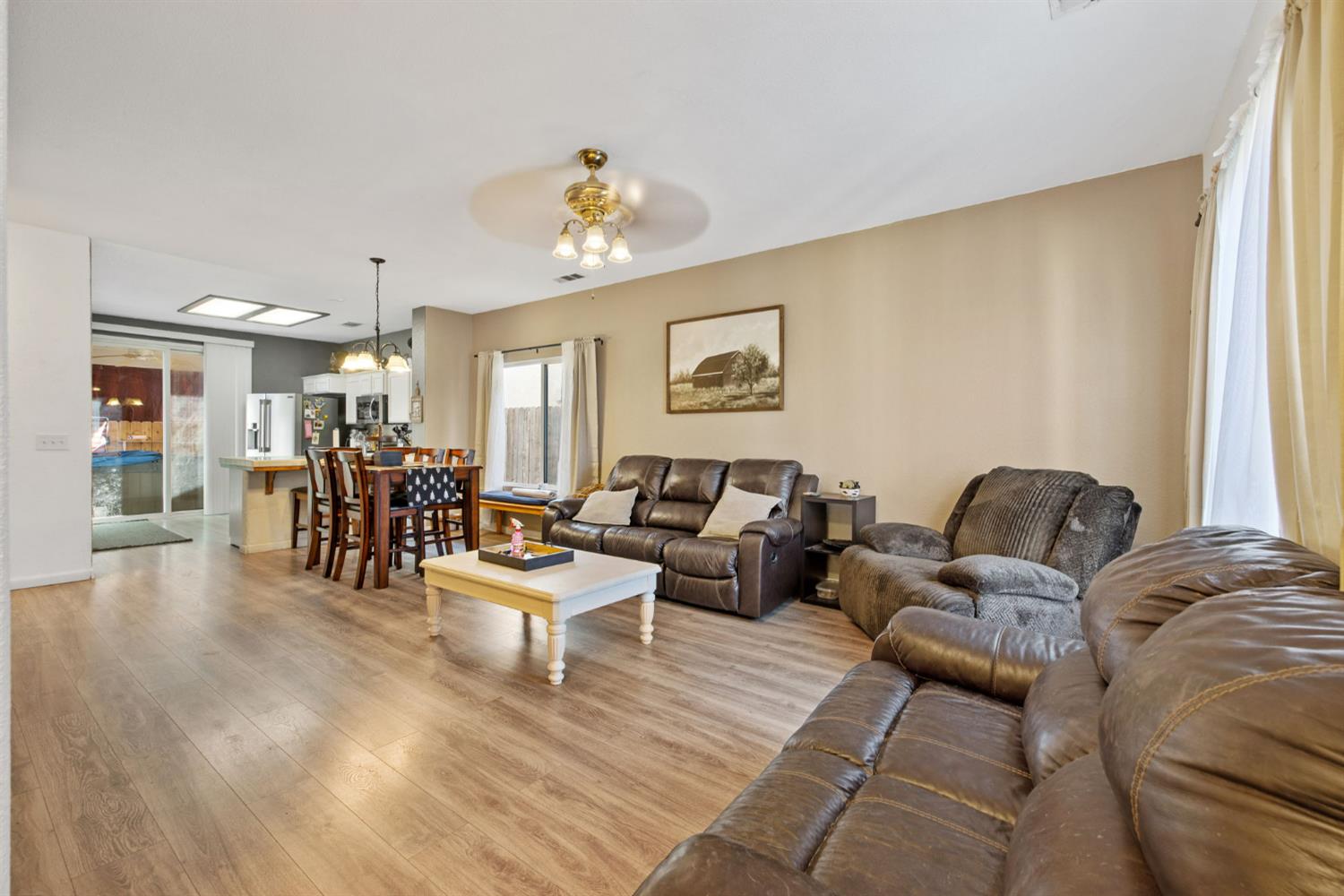 1963 West Merritt Street Hanford, CA 93230 - Photo 7 of 32 a living room with furniture and wooden floor