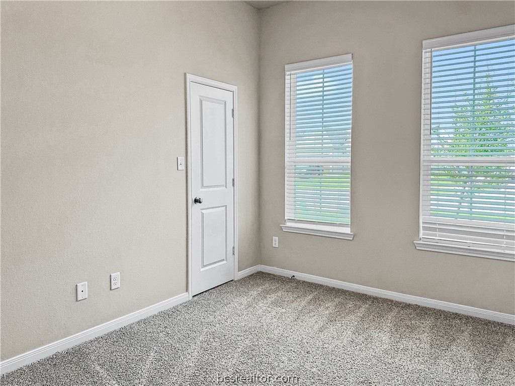 1971 Chief Street Bryan, TX 77807 - Photo 5 of 14 an empty room with windows