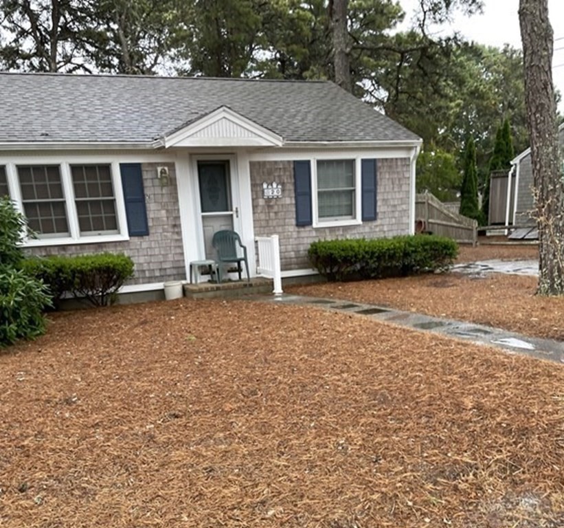 20 Lawrence Road Dennis Port, MA 02639 - Photo 1 of 29 a front view of a house with a yard
