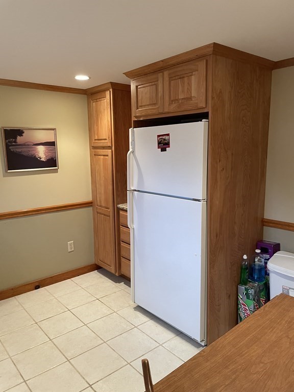 20 Lawrence Road Dennis Port, MA 02639 - Photo 12 of 29 a kitchen with a refrigerator and car
