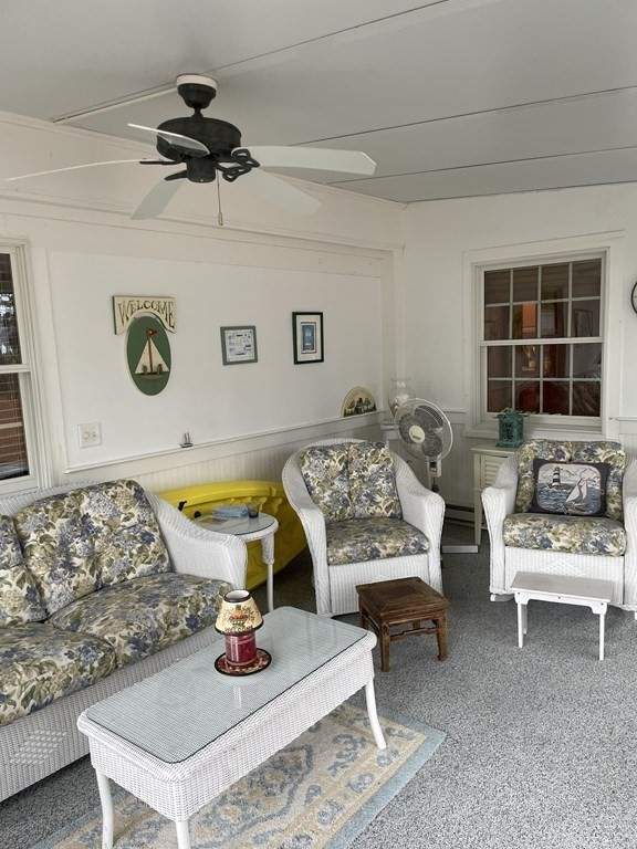 20 Lawrence Road Dennis Port, MA 02639 - Photo 17 of 29 a living room with furniture and a rug