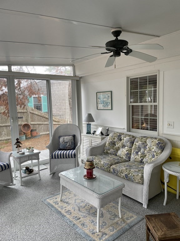 20 Lawrence Road Dennis Port, MA 02639 - Photo 18 of 29 a living room with furniture and a large window