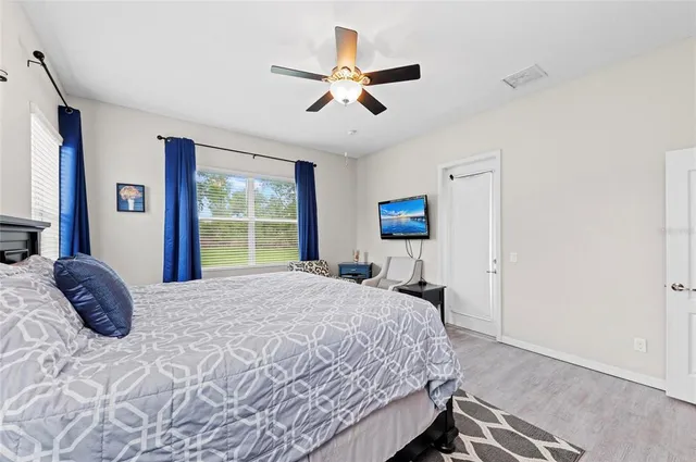 a bedroom with furniture and a bed