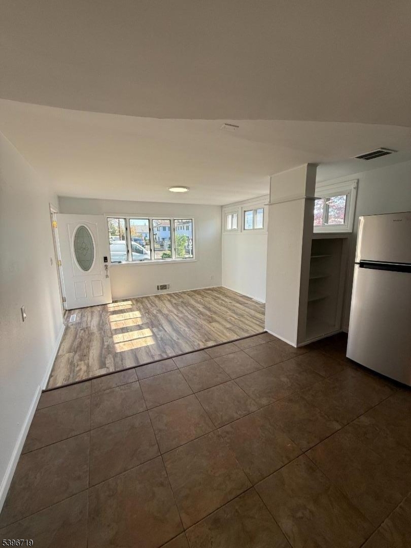 201 4th Street Clifton, NJ 07011 - Photo 5 of 8 a view of livingroom with natural light
