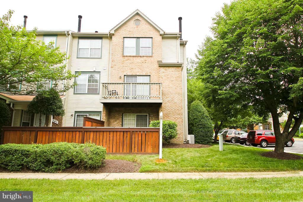 4739 Ridgeline Terrace, Unit 301 Bowie, MD 20720 - Photo 1 of 25 a view of a house with a yard