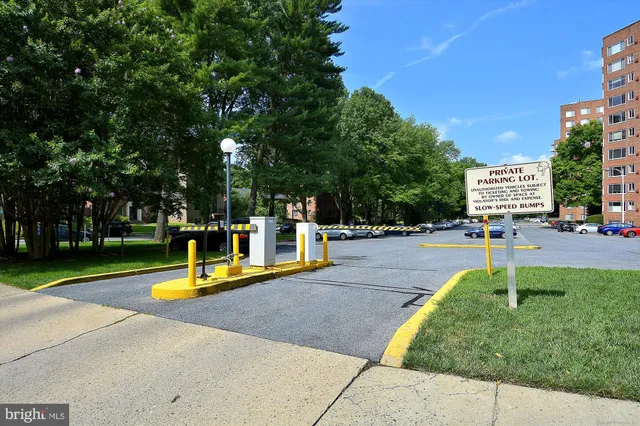 a view of outdoor space with garden and trees