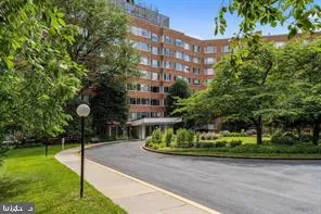 a front view of a building with garden