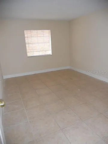 a view of a yard from a balcony