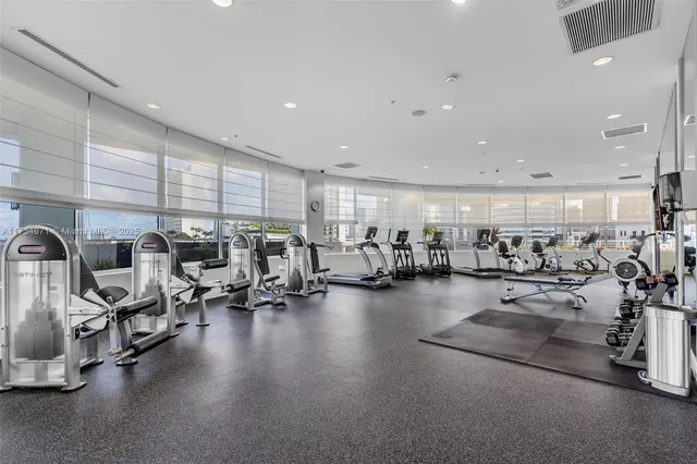 a view of a room with gym equipment