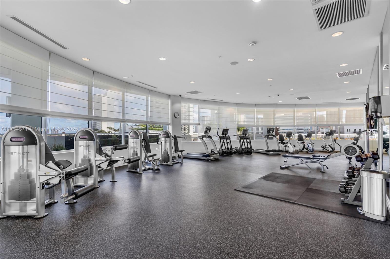 315 Northeast 3rd Avenue, Unit 1804 Fort Lauderdale, FL 33301 - Photo 17 of 20 a gym room with lots of furniture