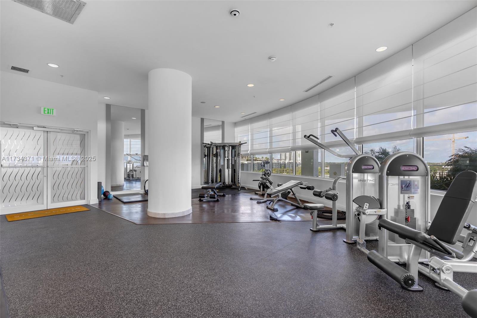 315 Northeast 3rd Avenue, Unit 1804 Fort Lauderdale, FL 33301 - Photo 18 of 20 a view of a room with gym equipment