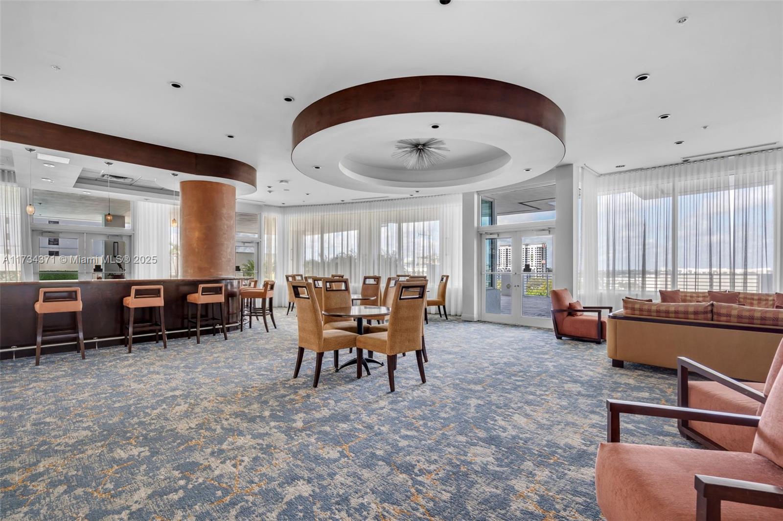 315 Northeast 3rd Avenue, Unit 1804 Fort Lauderdale, FL 33301 - Photo 19 of 20 a living room with furniture and a large window