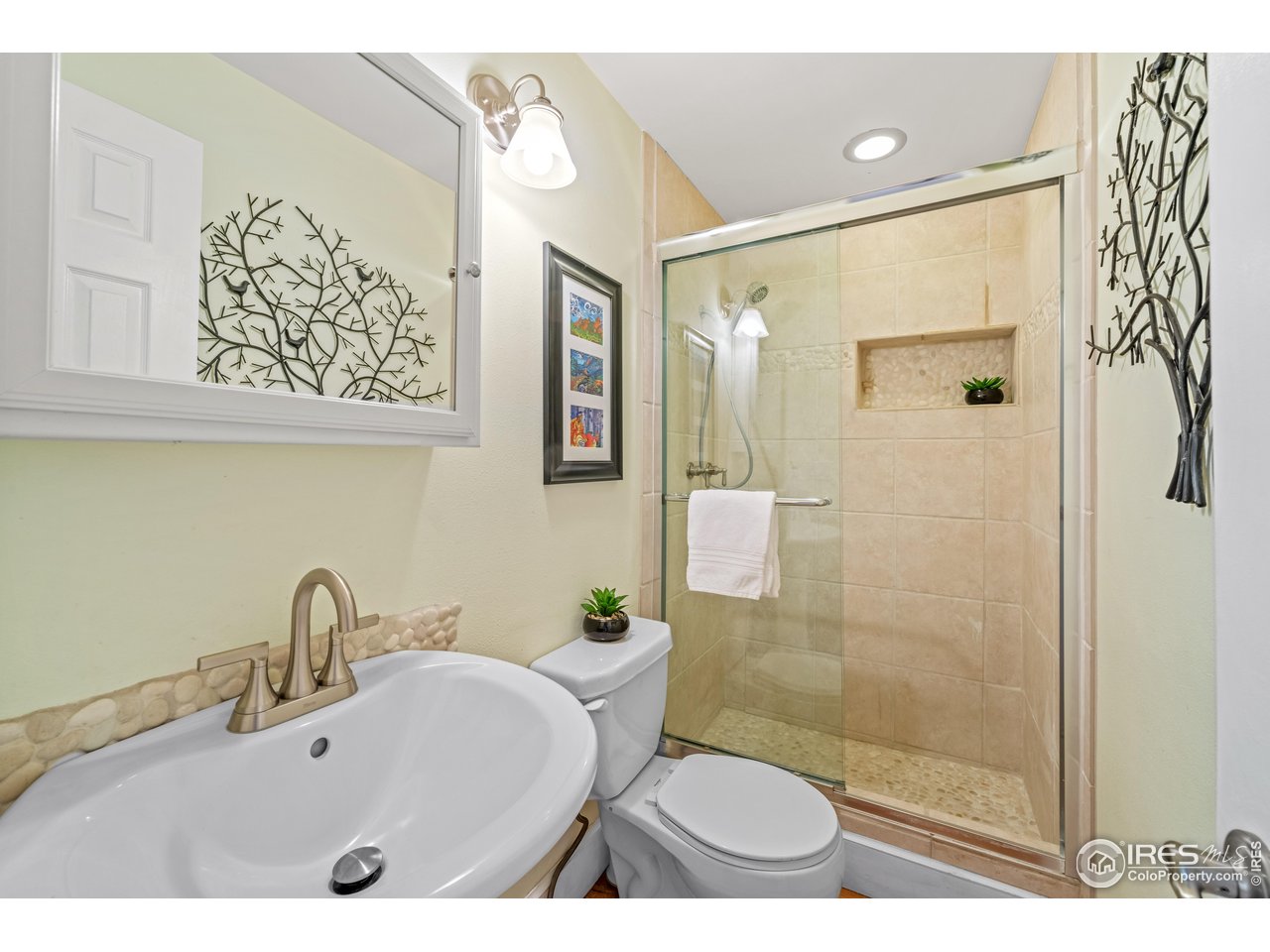 301 Valley Lane Boulder, CO 80302 - Photo 10 of 46 a bathroom with a sink and a shower