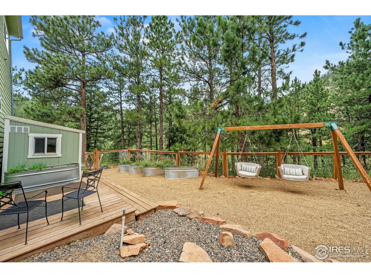 301 Valley Lane Boulder, CO 80302 - Photo 2 of 46 a backyard of a house with seating space
