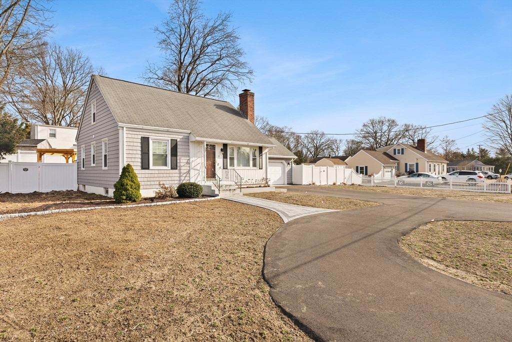 13 Cherry Hill Drive Seekonk, MA 02771 - Photo 2 of 40 a view of a house with snow on the road