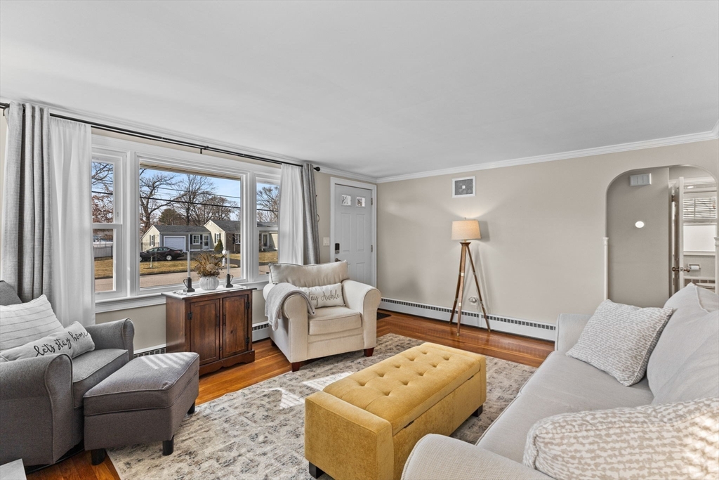 13 Cherry Hill Drive Seekonk, MA 02771 - Photo 7 of 40 a living room with furniture and a large window
