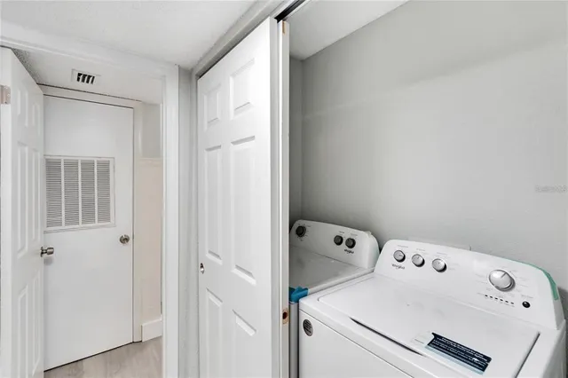 a view of utility room with washer and dryer