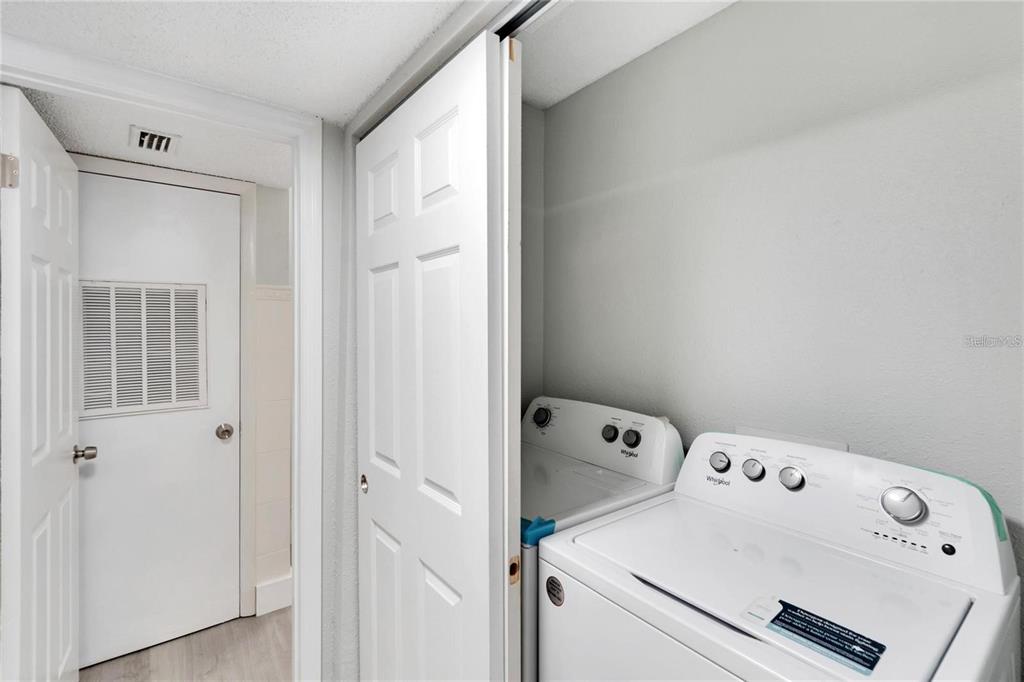 8718 Mallard Reserve Drive, Unit 101 Tampa, FL 33614 - Photo 13 of 25 a view of utility room with washer and dryer