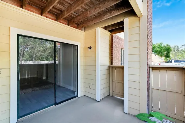 a view of front door and bedroom