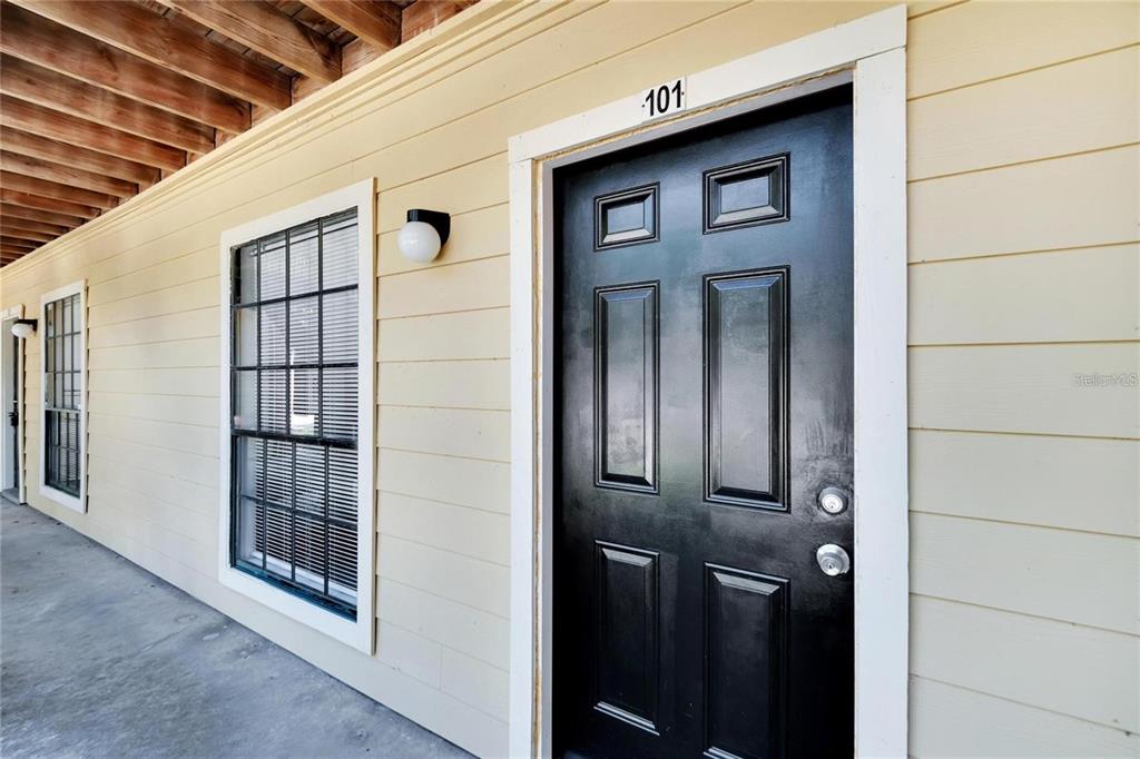8718 Mallard Reserve Drive, Unit 101 Tampa, FL 33614 - Photo 21 of 25 a view of front door of a house