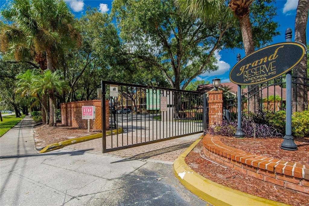 8718 Mallard Reserve Drive, Unit 101 Tampa, FL 33614 - Photo 22 of 25 a view of a park with iron fence