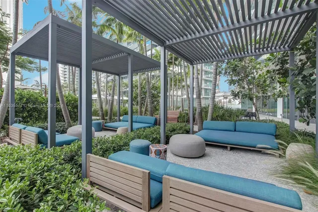 a view of a garden with couches