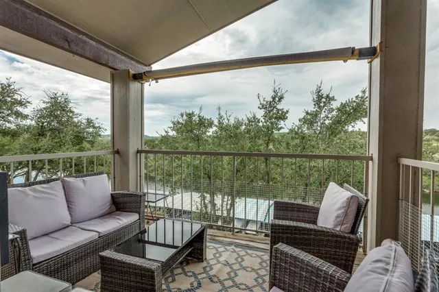 a view of a chair and couches in the deck