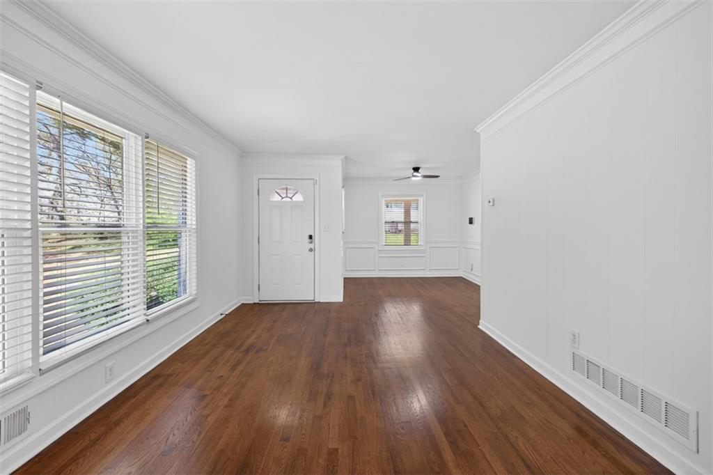 3061 Glendale Court Decatur, GA 30032 - Photo 11 of 21 a view of an empty room with wooden floor and a window