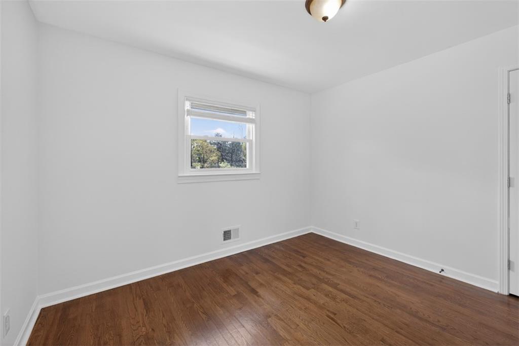 3061 Glendale Court Decatur, GA 30032 - Photo 13 of 21 a view of empty room with wooden floor