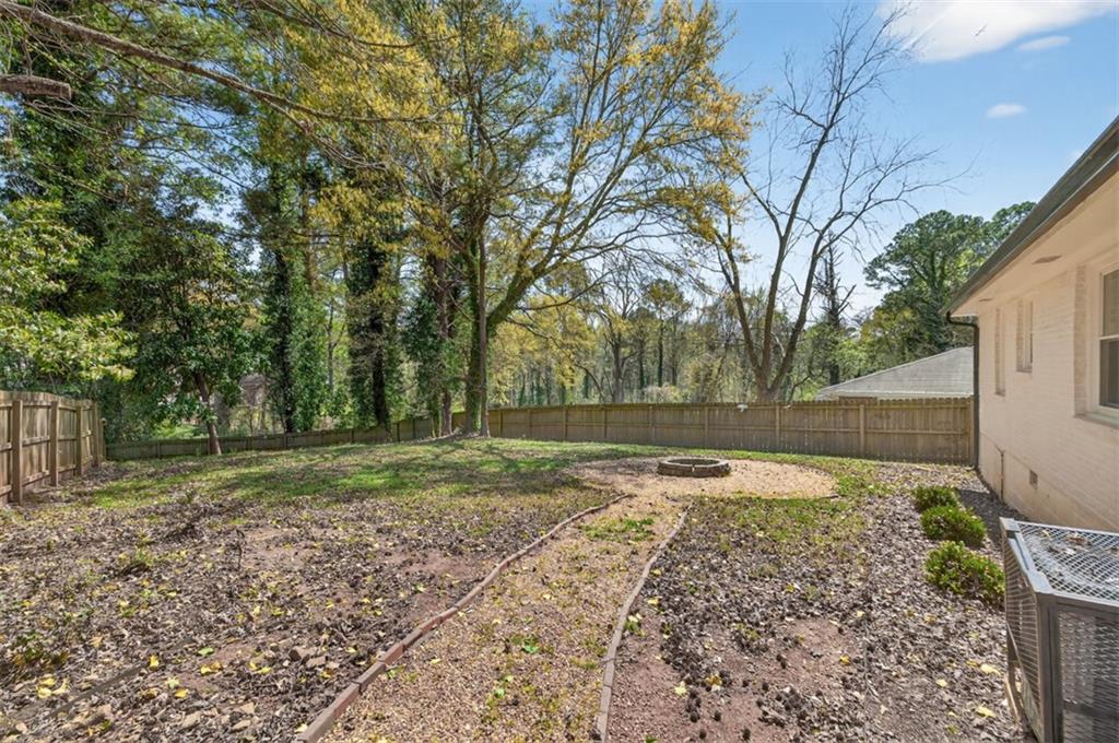 3061 Glendale Court Decatur, GA 30032 - Photo 20 of 21 a view of a backyard with large trees
