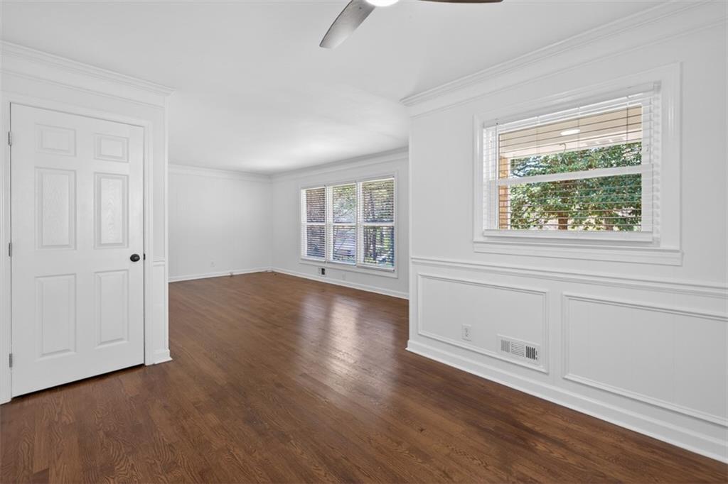 3061 Glendale Court Decatur, GA 30032 - Photo 9 of 21 an empty room with wooden floor and windows